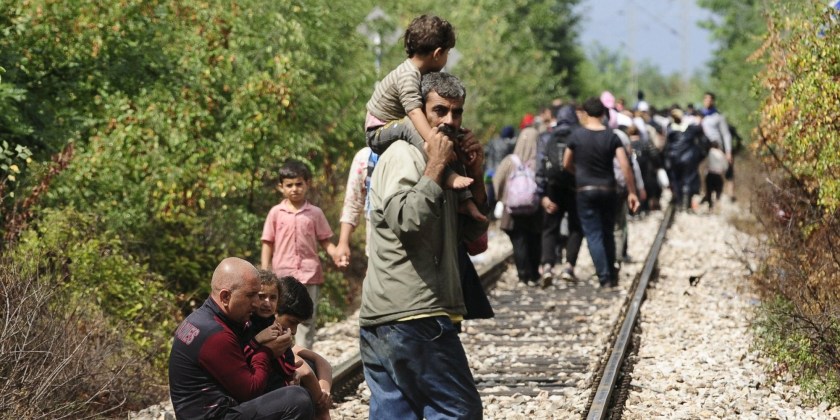 Migrants walk towards Gevgelija, Macedonia after crossing Greece's border into Macedonia